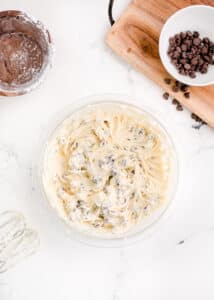 Cookie dough dip just mixed together with a hand mixer in a bowl.