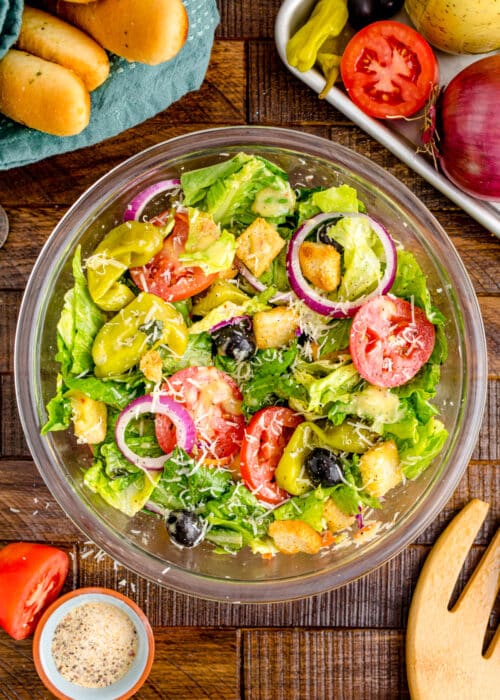 Copycat Olive Garden salad in a large mixing bowl.