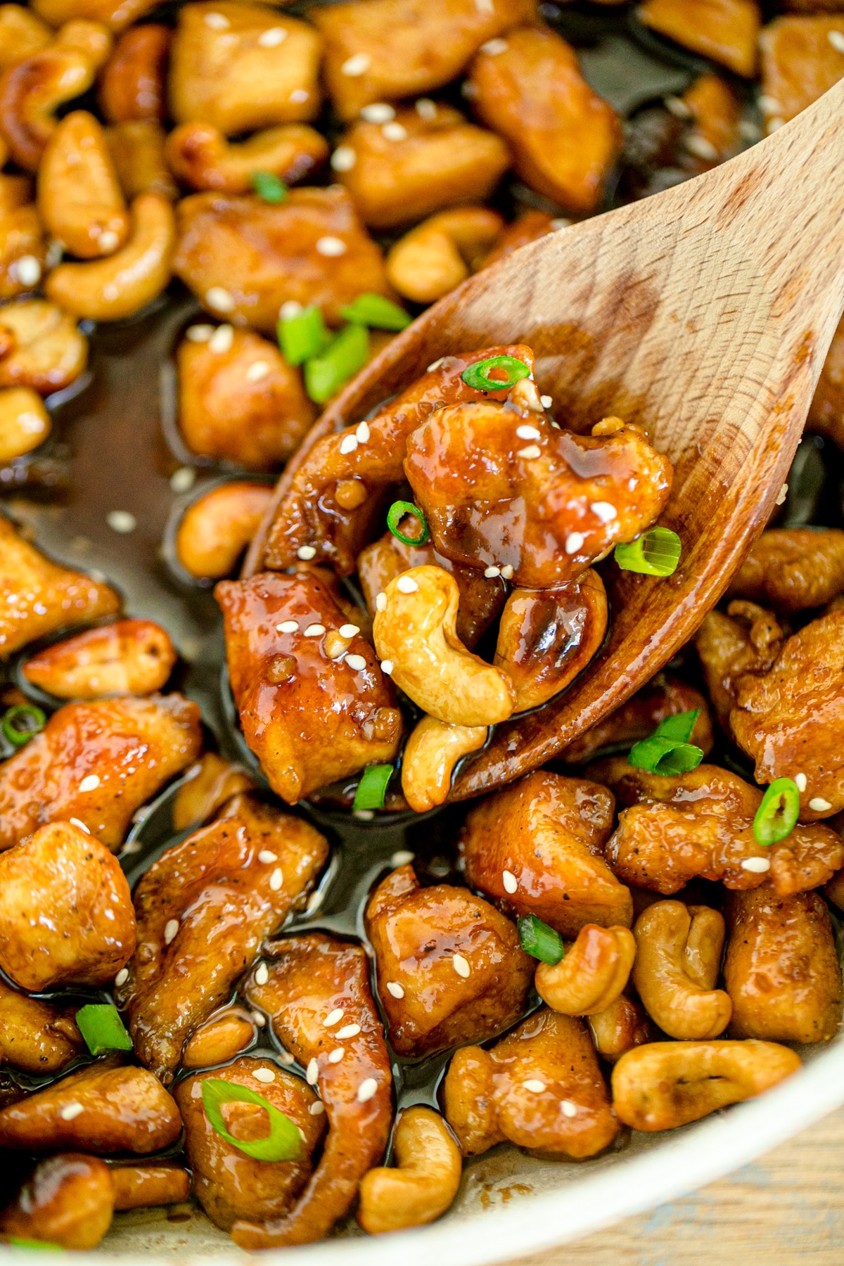 Cashew chicken in a large pot.